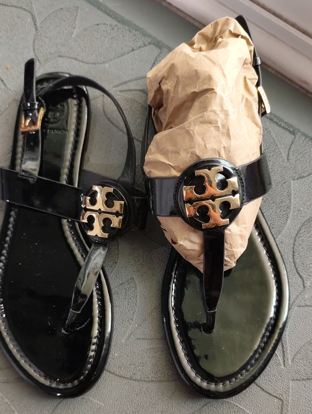 Tory Burch Black Patent Thong Sandals with Gold Logo Medallion
